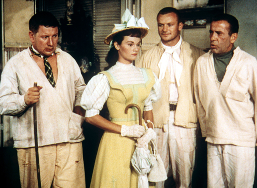 Die gewitzten Ganoven Jules (Peter Ustinov, li.), Albert (Aldo Ray, 2. v. re.) und Joseph (Humphrey Bogart) kümmern sich rührend um die liebeskranke Isabelle (Gloria Talbott). Bild: Sender