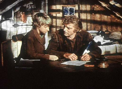 Elias Wakefield (Burt Lancaster, rechts) schreibt mit seinem Sohn Little Eli (Donald MacDonald) einen Brief an den amerikanischen Präsidenten. Bild: Sender